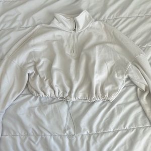 Cropped half zip up white sweat shirt, garage